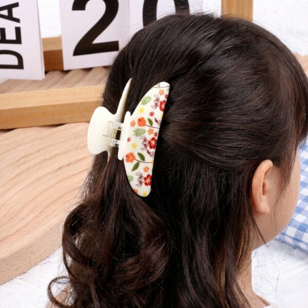 Virágos rajzfilm ihlette akril hajcsat – aranyos, elegáns dísz kontyhoz (cápa hajcsat)